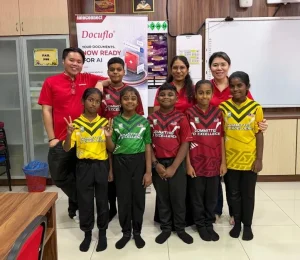 InfoConnect team with pupils at the A Meal A Day (AMAD) programme