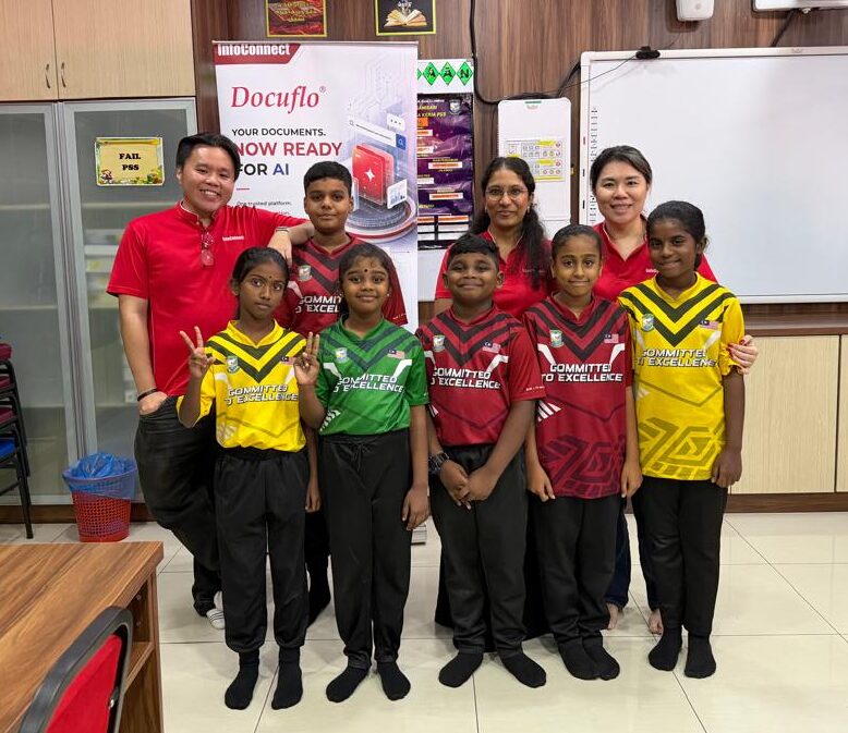 InfoConnect team with pupils at the A Meal A Day (AMAD) programme